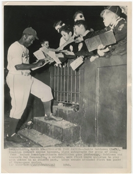 1949 Jackie Robinson Type III Photograph of Robinson Signing Autographs -PSA/DNA